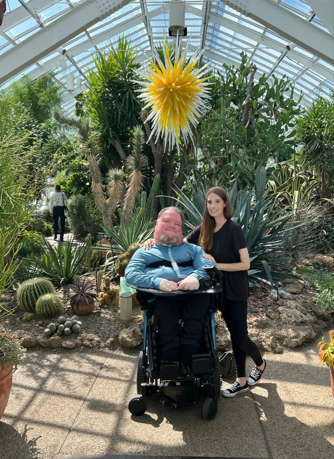 Steve and Vicki together in a garden conservatory.