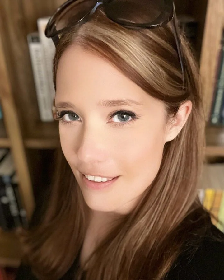 Vicki Karlovsky smiling, with sunglasses pushed up on her head.